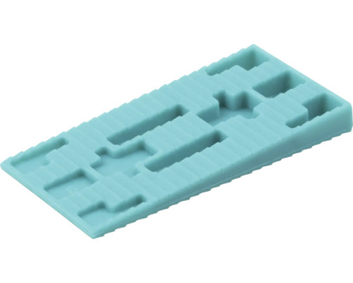 Obdélníková plastová podložka pod sklo s výřezy pro přesnou montáž oken a vyrovnání nerovností.