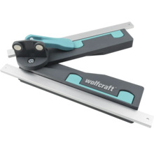 Pokosová úhlová šablona Wolfcraft s výsuvnými kovovými lištami a aretační páčkou.