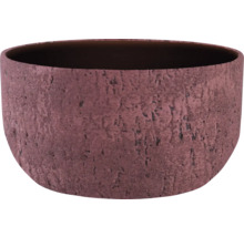 Kulatá miska na rostliny s výrazně strukturovaným povrchem.