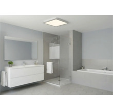 Moderní koupelna s umyvadlem, zrcadlem, sprchou a vanou