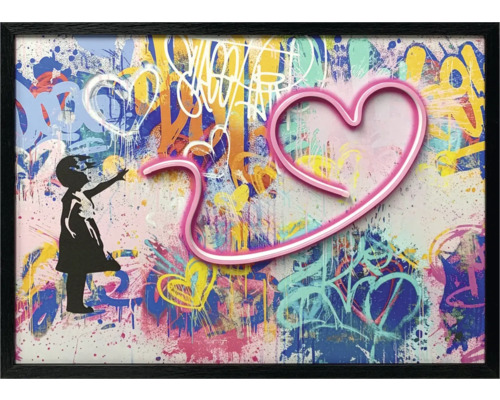 Nástěnné umění v rámu se siluetou dívky a motivem srdce
