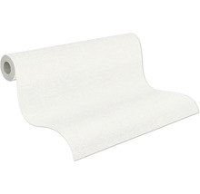 Strukturovaná vliesová tapeta, částečně rozvinutá role v bílé barvě s jemnou povrchovou strukturou.