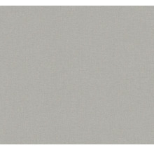Tapeta s jemnou lněnou strukturou v šedé barvě.
