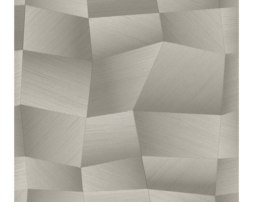 Šedá vliesová tapeta s geometrickým trojrozměrným vzorem nepravidelných mnohoúhelníků a jemnou liniovou strukturou.