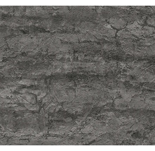 Tapeta se vzhledem kamene se strukturovaným povrchem a prasklinami.