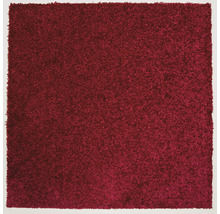 Detail červeného koberce se smyčkovou strukturou