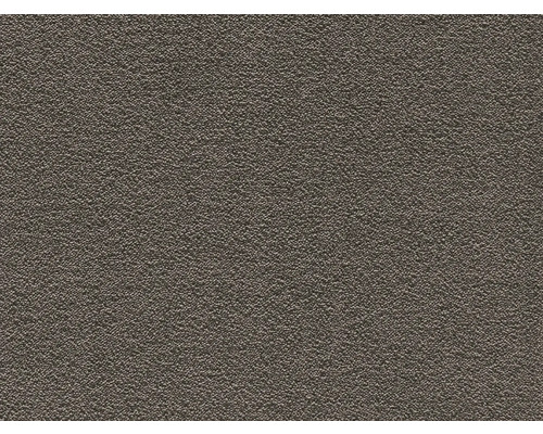 Detailní záběr na jemně strukturovaný, zrnitý povrch materiálu.