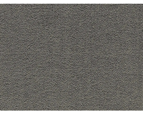 Detailní pohled na zrnitý povrch antracitové střešní lepenky z bitumenu.