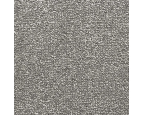 Textura šedého koberce se smyčkovým vlasem.