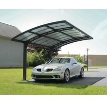 Auto pod přístřeškem s kovovým rámem a průhlednou střechou.