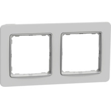 Dvojnásobný rámeček pro vypínače a zásuvky se zaoblenými rohy.