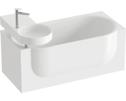 Bílá vana s integrovaným malým kulatým umyvadlem a baterií.