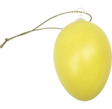 Žluté dekorační vajíčko k zavěšení s tenkou šňůrkou.