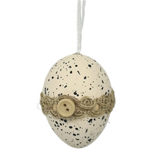 Dekorativní vajíčko s černými tečkami, jutovou stuhou a knoflíkem a poutkem na zavěšení pro velikonoční dekoraci.