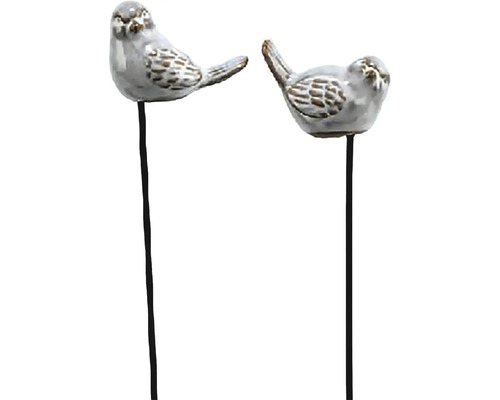 Dva zahradní zápichy s ptáčky na tenkých kovových tyčkách.