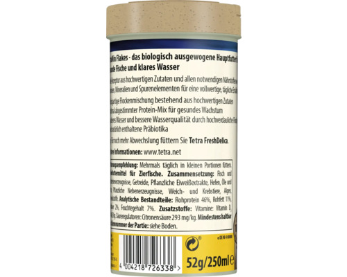 Zadní strana balení vločkového krmiva pro ryby Tetra TetraMin s informacemi o produktu, složením a čárovým kódem.