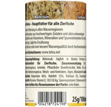 Zadní strana plechovky krmiva pro okrasné ryby se složením, doporučením ke krmení, čárovým kódem a údaji o hmotnosti 25 gramů a objemu 100 mililitrů.