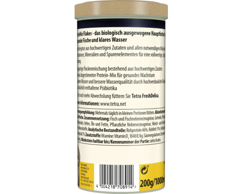Zadní strana dózy s krmivem pro ryby TetraMin Flakes se složením, analytickými složkami a doporučeným krmením.