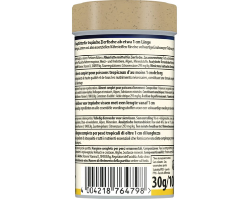 Zadní strana krmiva pro tropické ryby od délky přibližně 1 centimetr, se složením, nutričními hodnotami, čárovým kódem a hmotností 30 gramů.