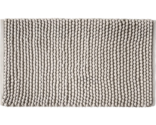 Koberec do koupelny Grund PUNTO UNO 70 x 120 cm béžová Světle šedá obdélníková koupelnová předložka s měkkou nopkovou strukturou a vysokým vlasem uspořádaným v řadách.