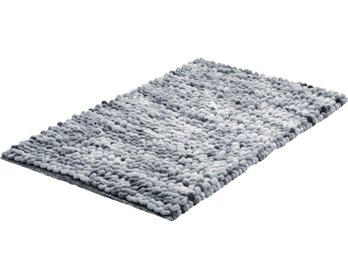 Obdélníková koupelnová předložka se strukturovaným povrchem v designu oblázků v šedých odstínech.