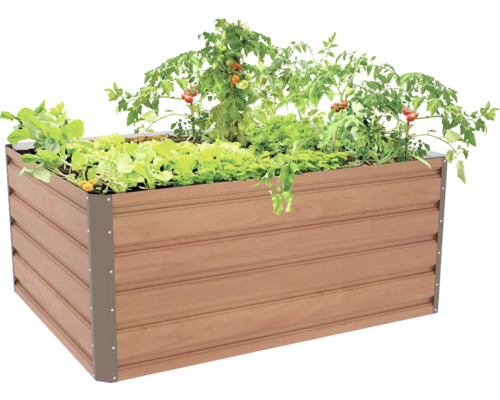 Obdélníkový vyvýšený záhon v dekoru dřeva s tmavě šedými rohovými profily, osázený rajčaty a listovou zeleninou.