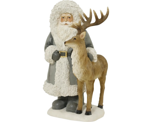 Dekorační figurka Santa Clause s bílým plnovousem v šedém kabátě vedle soba na zasněženém podstavci