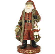 Vánoční figurka Santa Claus s medvídkem v pytli a marionetou, červená s kožešinovým lemem na podstavci.