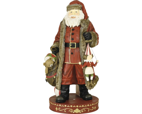 Vánoční figurka Santa Claus s medvídkem v pytli a marionetou, červená s kožešinovým lemem na podstavci.
