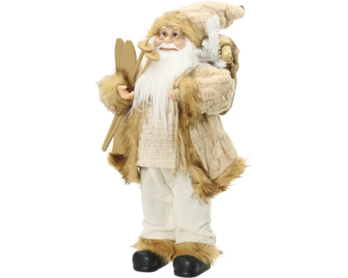 Dekorativní Santa Claus s lyžemi, hůlkami a pytlem, béžový kabát s umělou kožešinou, bílé kalhoty, černé boty.