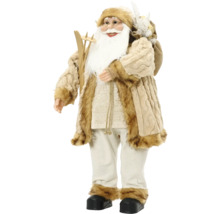 Figurka Santa Clause s lyžemi, jutovým pytlem a bílým vousem v béžovém plyšovém kabátě.
