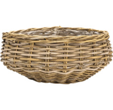 Kulatý proutěný koš na rostliny s vnitřní plastovou fólií.