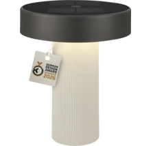 Válcová solární stolní lampa s bílou žebrovanou základnou a tmavou horní částí, pečeť German Design Award Winner 2026.
