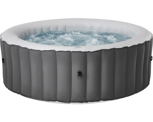 Nafukovací šedá vířivka s bublající vodou a žebrovanou vnější stěnou.