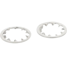 Dvě vějířové podložky s vnitřním ozubením z kovu.