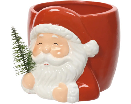 Vánoční keramický květináč ve tvaru Santa Clause s malým vánočním stromkem.