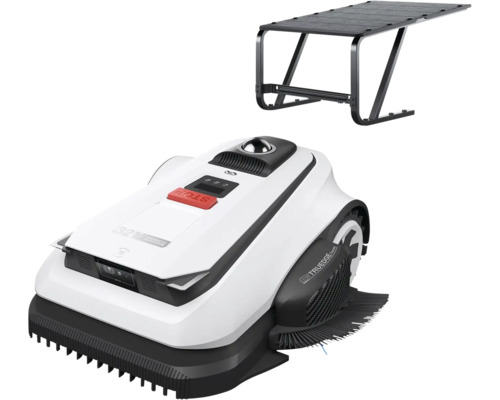 Robotická sekačka s bílým krytem, černými detaily a červeným tlačítkem stop, včetně černé garážové střechy.