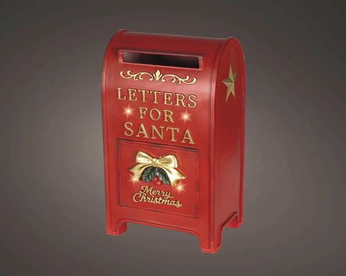 Červená vánoční poštovní schránka s nápisem Letters for Santa, zlatou hvězdou a mašlí.