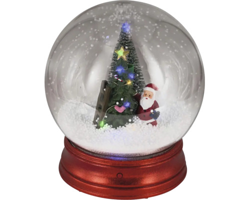 Sněžítko s postavou Santa Clause, zdobeným vánočním stromkem, žebříkem a LED osvětlením na červeném podstavci.