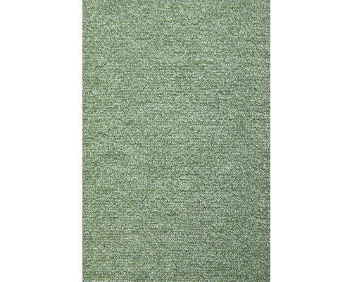 Detailní záběr na zelený koberec se strukturovaným povrchem.