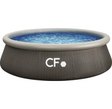 Kruhový nadzemní bazén s ratanovým vzhledem, nafukovacím prstencem a CF Logo.