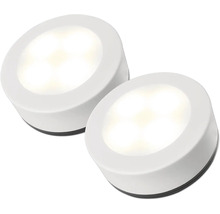 Dvě bílá kulatá LED podhledová svítidla z plastu pro montáž pod skříňku.