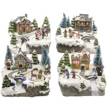 Čtyři vánoční miniaturní vesnické krajiny s domy, postavami a stromy