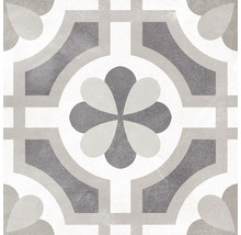 Dekorativní podlahová dlaždice s geometrickým a květinovým vzorem