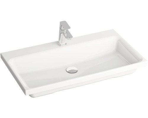 Bílé keramické umyvadlo s baterií