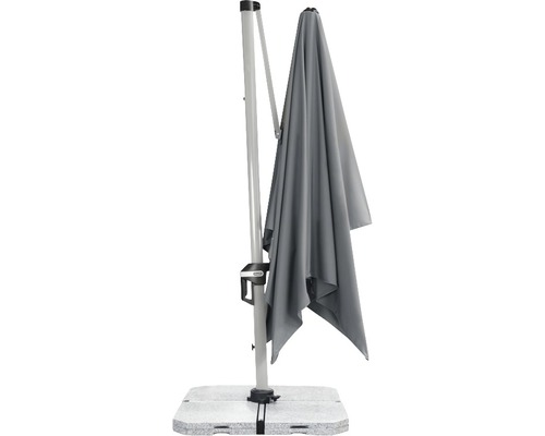 Šedý slunečník na kamenné desce