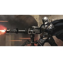 Mandalorian s těžkou zbraní na trojnožce.
