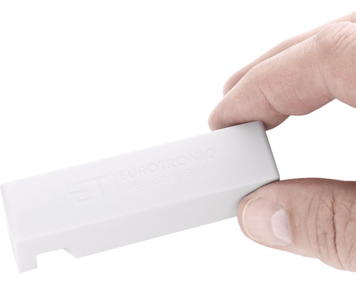 Okenní kontakt Eurotronic Technology GmbH v ruce