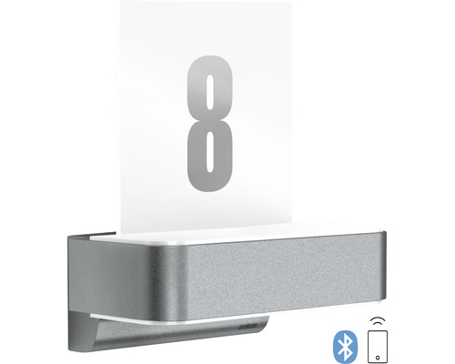 Svítidlo do zrcadlové skříňky s číslem osm a symbolem Bluetooth