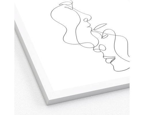 Obraz v rámu s čárovou kresbou dvou tváří